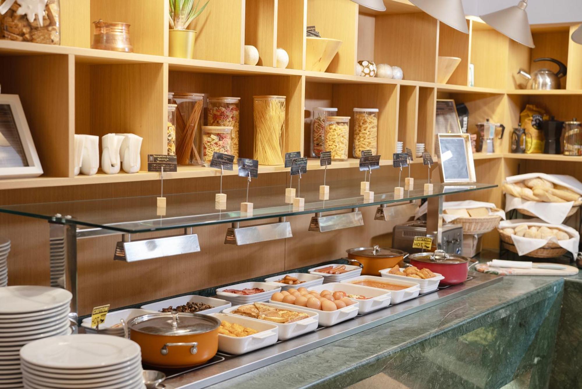 Maison Sofia - Mgallery Bagian luar foto A buffet at a hotel